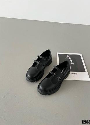 Черные кожаные туфли с тонкими ремешками пряжками на толстой подошве5 фото