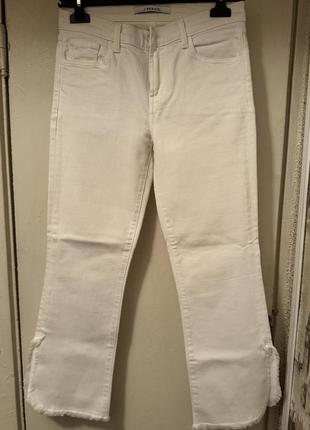 Джинсы белые с разрезами