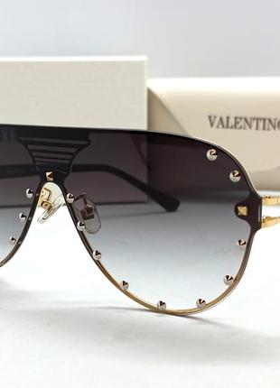Valentino сонцезахисні окуляри унісекс маска сірий градієнт в золотому металі