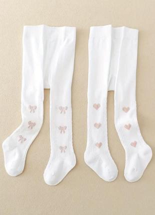 Білі колготки з малюнком