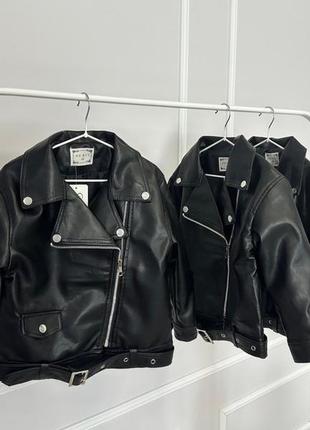 Трендовая косуха с поясом.