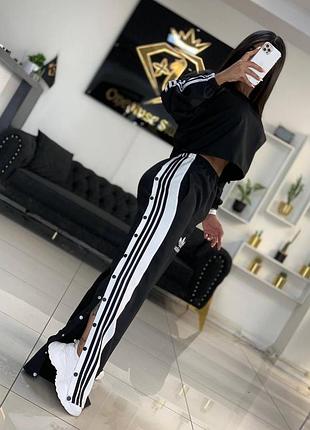 Костюм спортивный женский черный с лампасами оверсайз свитшот брюки свободного кроя на выс...