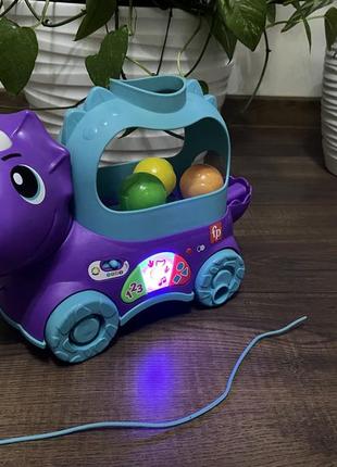 Веселый трицератопс fisher-price, многоязычный