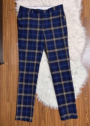 Темно сині класичні чоловічі брюки в клітинку завужені