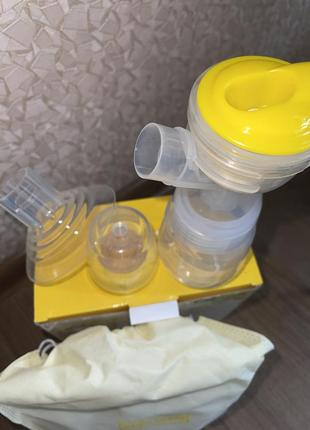 Молокоотсос механический