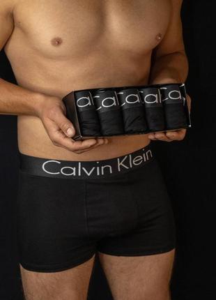 Модель calvin klein полностью черные с белой надписью