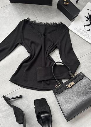 Трикотажна кофточка в рубчик