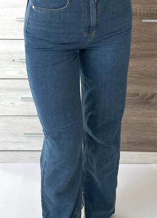 Джинсы голубые