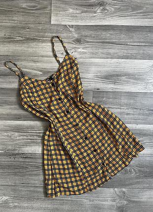 Сарафан в клітинку на ґудзиках