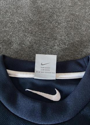 Вінтажна футболка nike4 фото
