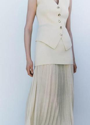 Комбінована трикотажна спідниця з плісированим низом