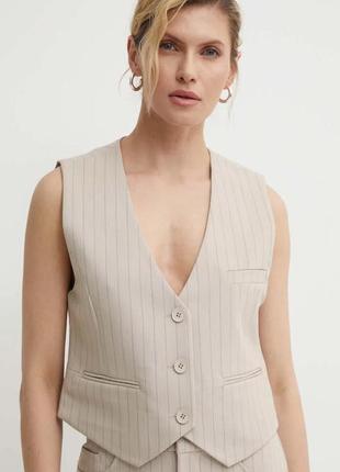 Жилетка
