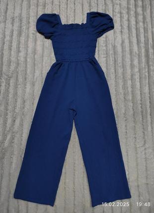 Фірмовий комбінезон з брючками-кюлоти,ромпер для дівчинки 9-10 р.