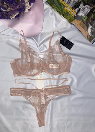 Комплект бюст 38 85 е/80 75 d д + л/м трусикі стрінг від hunkemoller нюдовий
