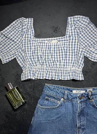 Стильний топ у клітинку