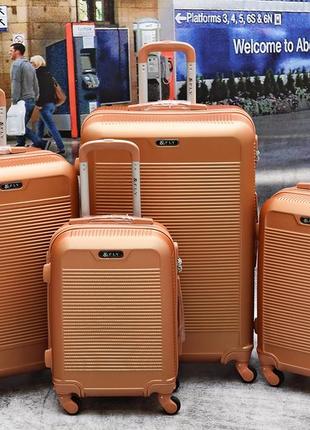 Прочный надежный чемодан fly для путешествий poland8 фото