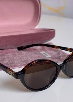 Miu miu женские солнцезащитные очки