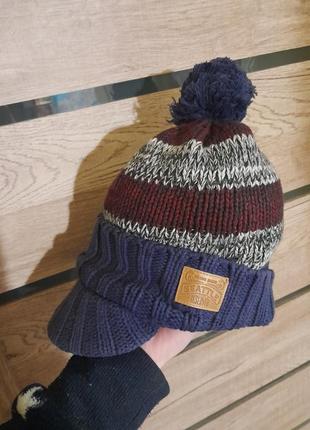 Шапка-кепка с бубеном и с подкладкой на флисе.