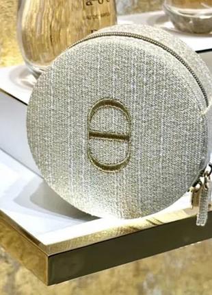 Золотий чохол для макіяжу або прикрас dior.