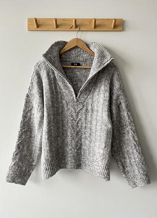 Стильний сірий светр