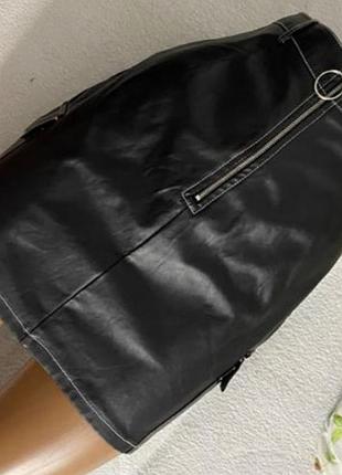 Юбка кожзам с карманами