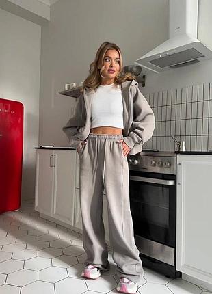 Женский спортивный костюм с молнией и брюками палаццо
