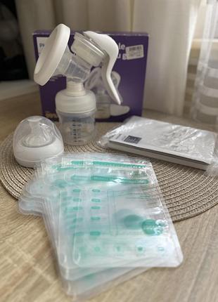 Молоковідсмоктувач philips avent  механічний+пакети для молока