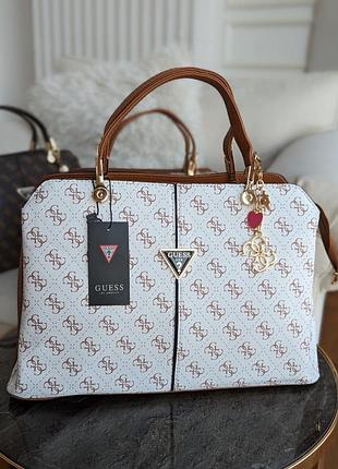 Сумка guess noelle большая на три отдела lux.4 фото
