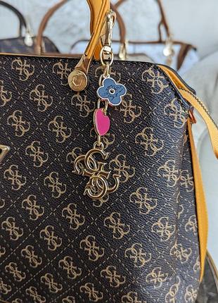 Сумка guess noelle большая на три отдела lux.9 фото