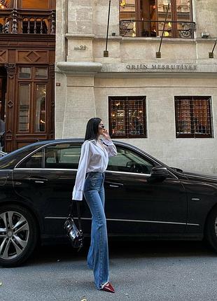 Джинсы с рваным низом. турция