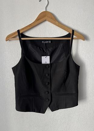 Стильна нова укорочена жилетка stradivarius