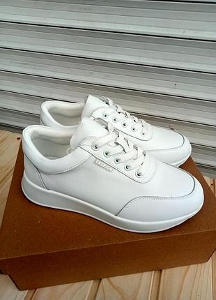 Кросівки шкіряні білі