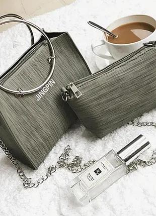 Модна міська сумочка з кільцями та мініклатчем