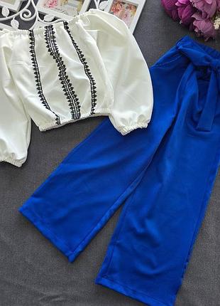 Стильный классический костюм, блуза-топ и брюки палаццо