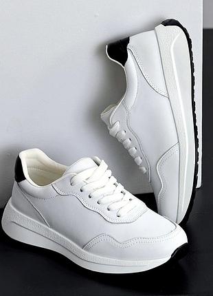 Кросівки жіночі білі шкіряні