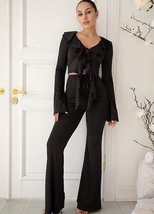 Черные лосины клеш с высокой посадкой на талии