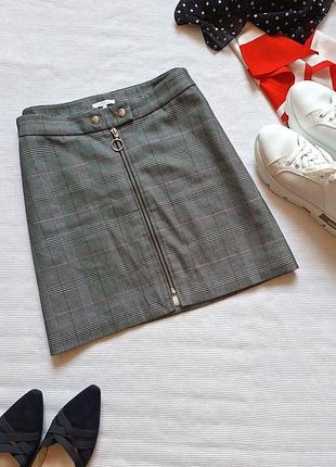 Спідниця міні в клітинку на застібці