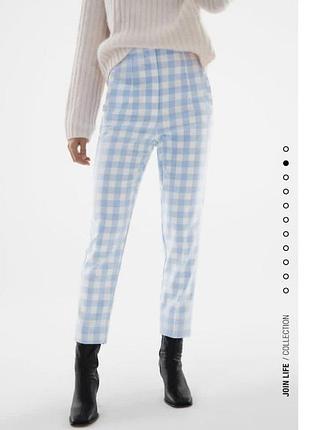 Стрейчевые укороченные брюки в клетку