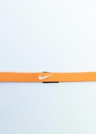Помаранчева силіконова резинка на голову nike