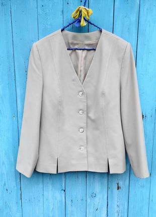 Елегантний бежевий жакет,піджак,48-50разм..