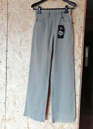 Новые джинсы с дефектом