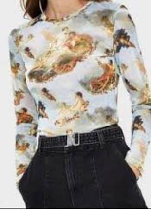 Эластичный лонгслив спишем