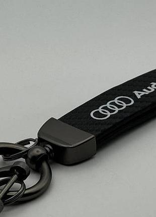 Стильний брелок з логотипом audi ремінцем на ключі з карабіном темний хром