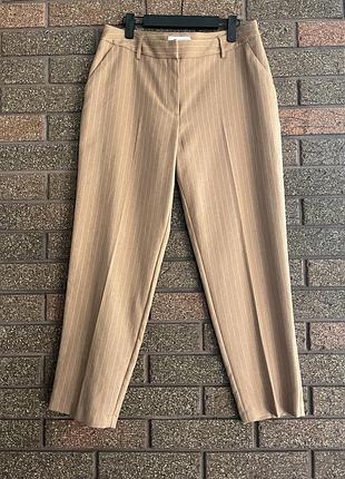 Брюки в смужку завужені до низу👝