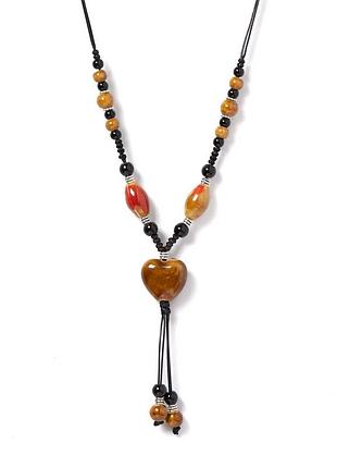 Эффектное украшение керамические бусины сердце