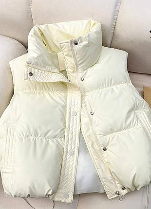 Женская жилетка