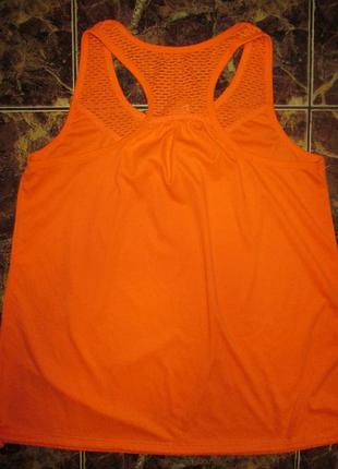 Яркий оранжевый цвет,спортивная майка-трапеция на кулиске,12\14р