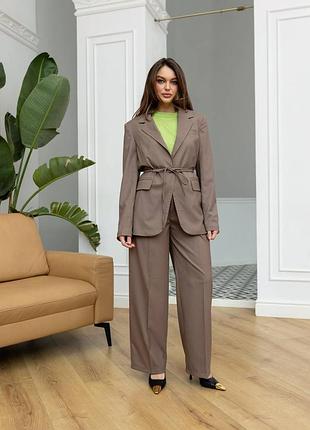 Брючний костюм піджак з поясом і брюки палаццо