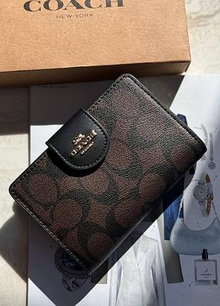 Гаманець coach