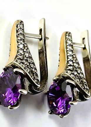 Серебряные сережки с золотыми пластинами и камнями.